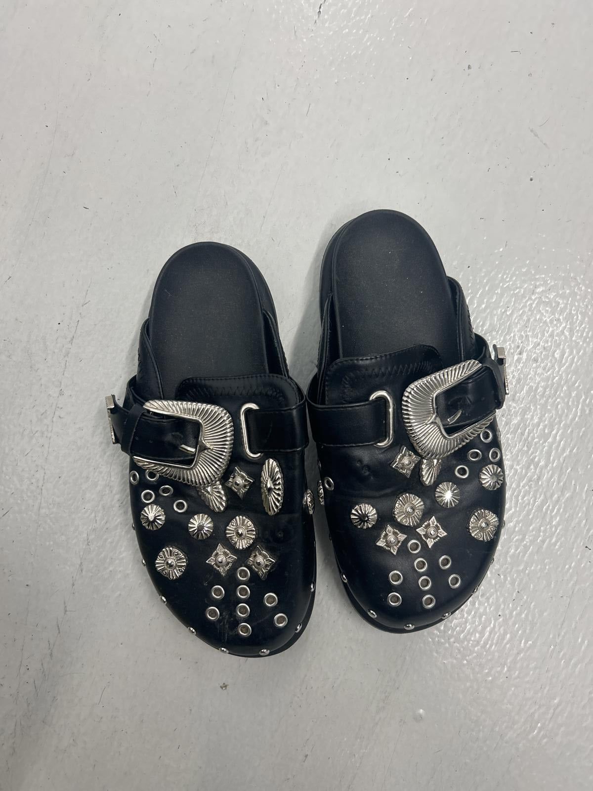 Grungey Black Buckle Clogs with Decorative Studs