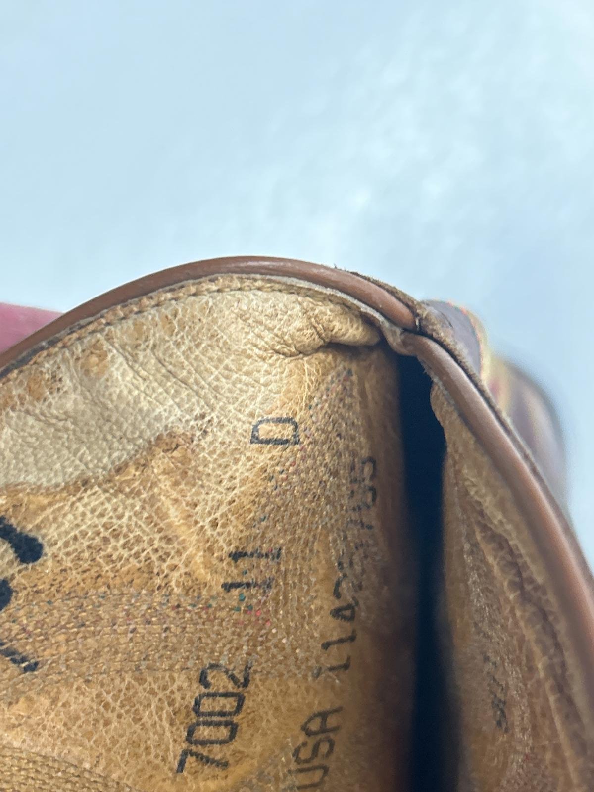 Vintage Brown Leather Cowboy Boots with Intricate Stitching