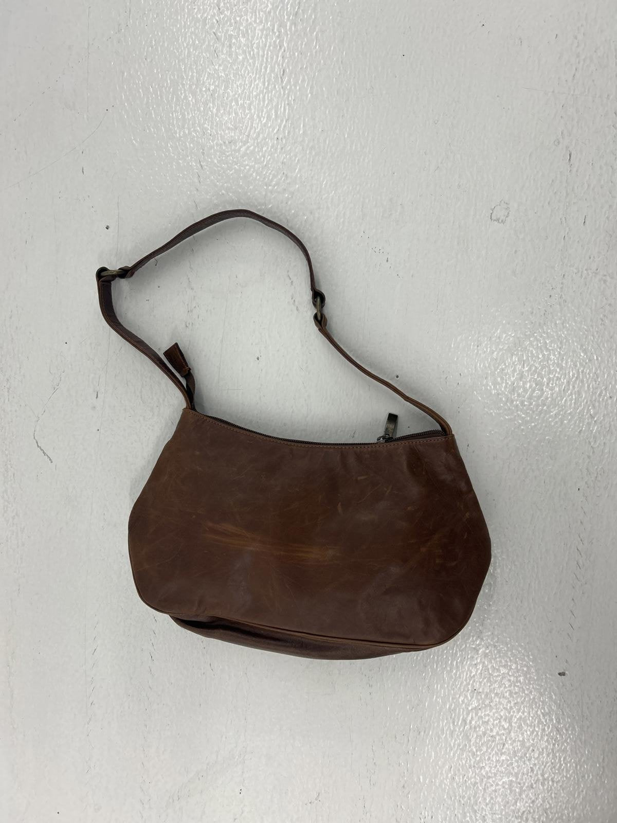 Brown Leather Handbag with Decorative Closure