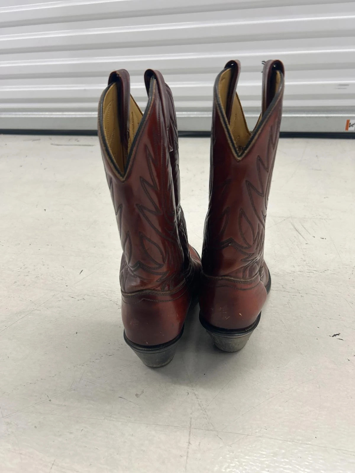 Vintage Red Leather Cowboy Boots With Intricate Design