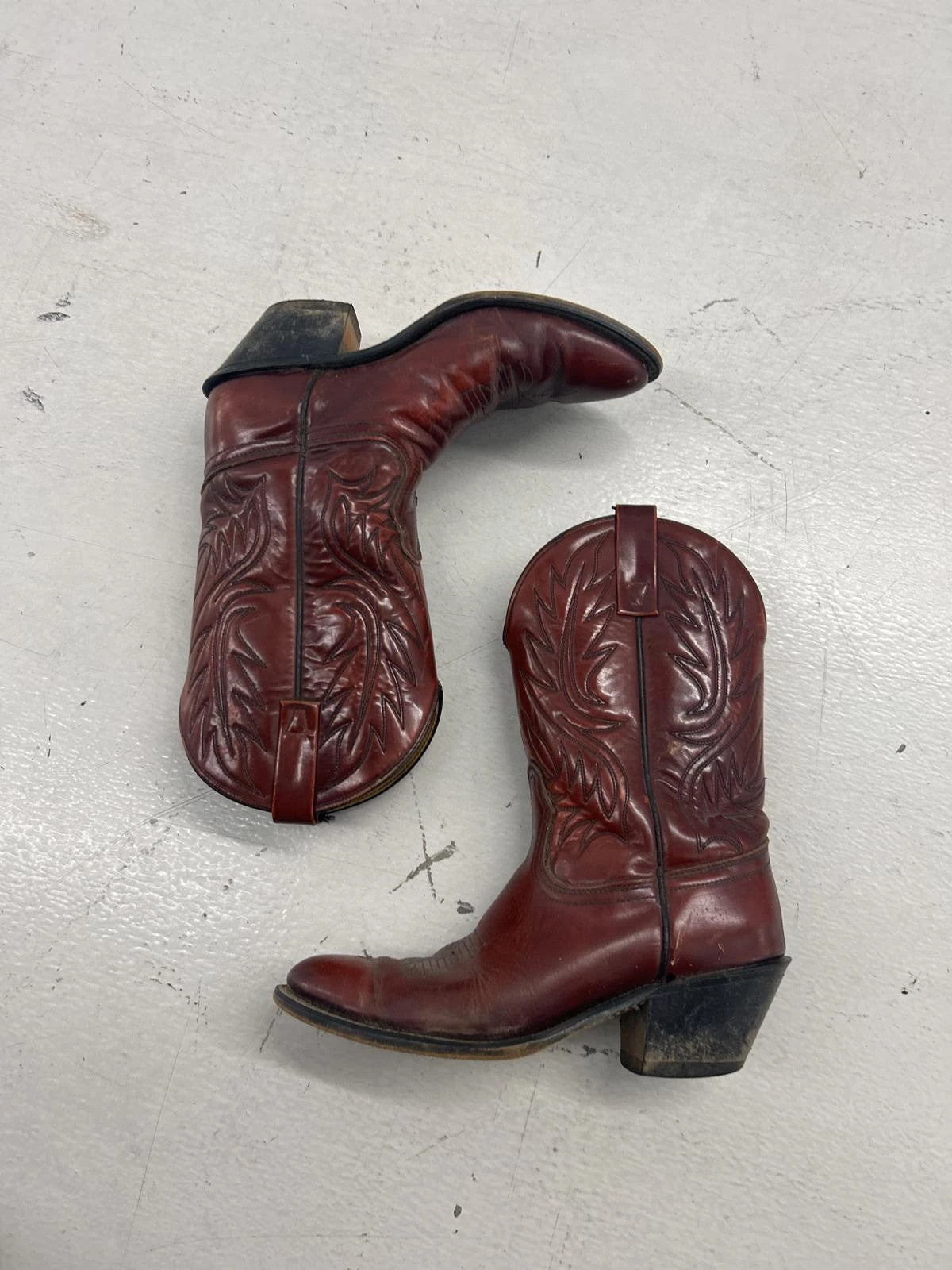 Vintage Red Leather Cowboy Boots With Intricate Design