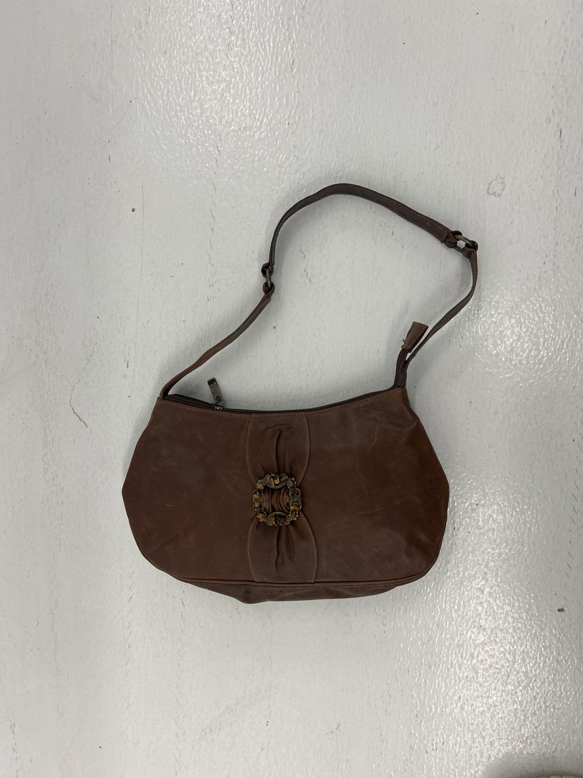 Brown Leather Handbag with Decorative Closure