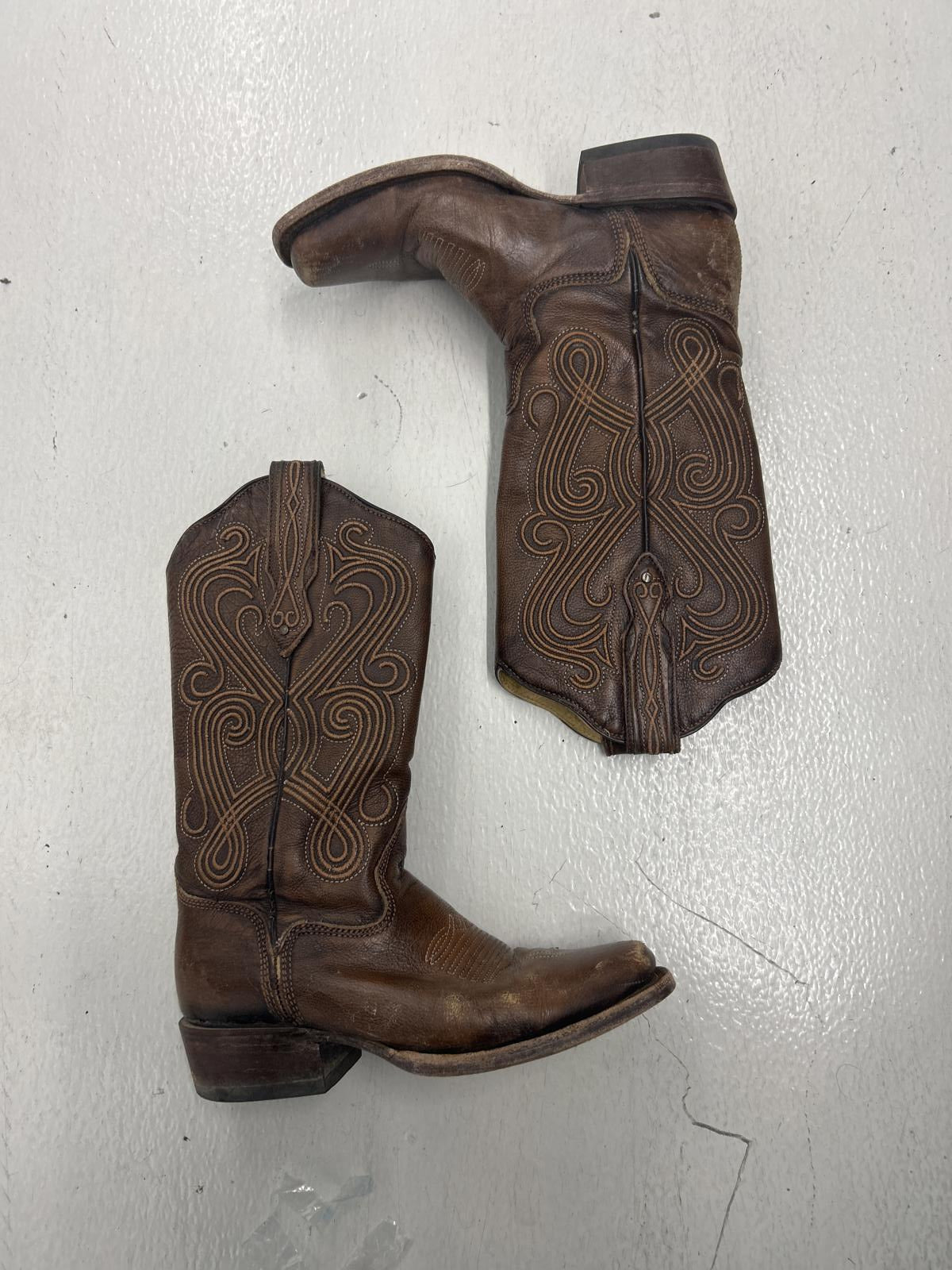 Retro Brown Leather Cowboy Boots with Intricate Stitching