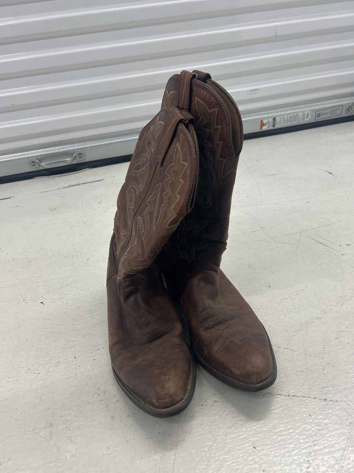 Vintage Brown Leather Cowboy Boots with Intricate Stitching