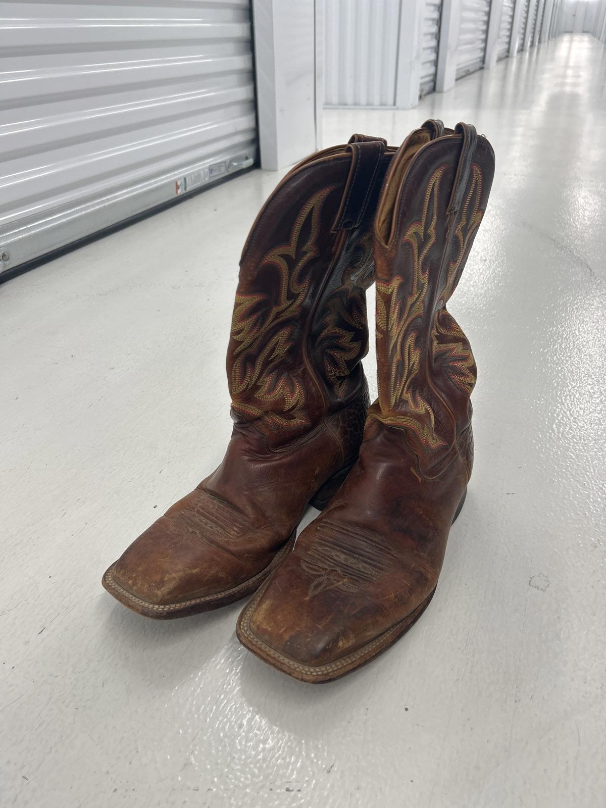 Vintage Brown Leather Cowboy Boots with Intricate Stitching