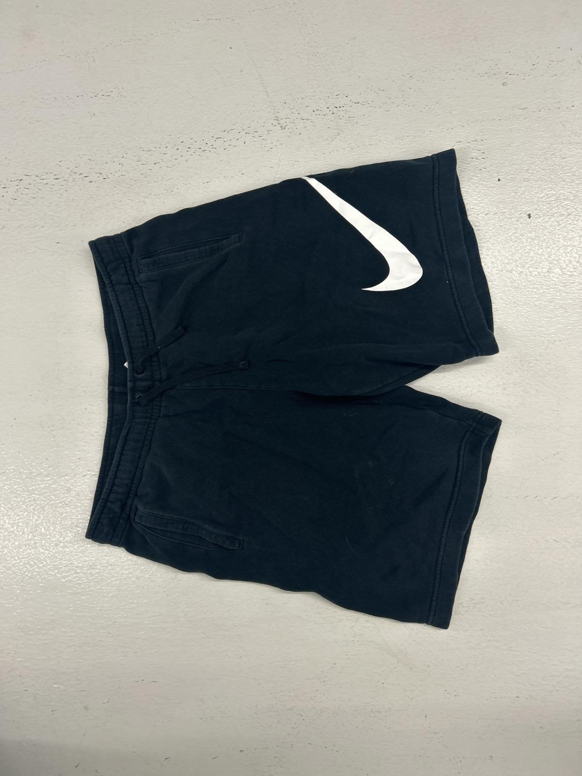 Nike Black Athletic Shorts with Iconic White Swoosh